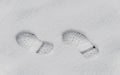 Footsteps in the snow, boot mark close up outdoor