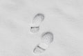 Footsteps in the snow, boot mark close up outdoor