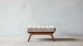 Footstool By West Elm In Front Of White Empty Wall Image
