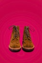 Footwear Concept. Pair of Tan Brown Suede Split Toe High Boots Close - up With Rubber Sole Placed In Line Together Straight Over Royalty Free Stock Photo