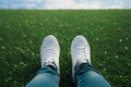 Footwear flair Selfie of feet in white sneakers on grass