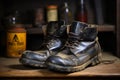 Footwear history Black shoes, old boots on a shoe rack