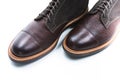 Footwear Ideas. Closeup of Toes of Premium Dark Brown Grain Brogue Derby Boots Made of Calf Leather with Rubber Sole Placed in Royalty Free Stock Photo