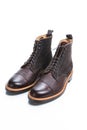 Footwear Ideas. Pair of Premium Dark Brown Grain Brogue Derby Boots Made of Calf Leather with Rubber Sole Placed in Line Together Royalty Free Stock Photo
