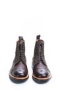Footwear Ideas. Premium Dark Brown Grain Brogue Derby Boots Made of Calf Leather with Rubber Sole Isolated Over White Royalty Free Stock Photo