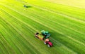 Forage harvester during grass cutting for silage in field. Harvesting biomass crop. Self-propelled Harvester for agriculture Royalty Free Stock Photo