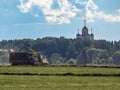 Forage harvesting in the fields. Royalty Free Stock Photo