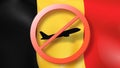 Forbbiden sign with crossed out plane on the background of Belgian flag. Royalty Free Stock Photo