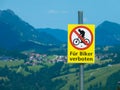 Forbidden for cyclists. Roadsign with blurred background Royalty Free Stock Photo