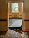 Forced doors of old abandoned hospital room Royalty Free Stock Photo