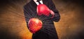 Forceful businessman boxing