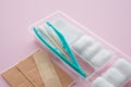 Forceps, plasters, cotton ball, gauze  Sterile dressing set  on pink background. First aid kit at home, healthcare and medical Royalty Free Stock Photo