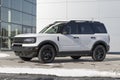 Ford Bronco display at a dealership in snow. Broncos can be ordered in a base model or Ford has up to 200 accessories for street Royalty Free Stock Photo