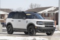 Ford Bronco display at a dealership in snow. Broncos can be ordered in a base model or Ford has up to 200 accessories for street Royalty Free Stock Photo