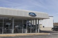 Ford Car and Truck Dealership. Ford sells cars, SUVs, pick up trucks and heavy duty vehicles Royalty Free Stock Photo