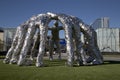 Ford center and cowboys huddle sculpture