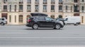 Ford Explorer SUV vehicle on the city road. Fast moving black car on Moscow streets. Accelerating with low-emission. Compliance Royalty Free Stock Photo