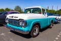1958 Ford F100 classic pick-up truck on the parking lot. Rosmalen, The Netherlands - May 8, 2016 Royalty Free Stock Photo