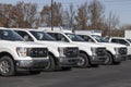 Ford F-150 display at a dealership. The Ford F150 is available in XL, XLT, Lariat, King Ranch, Platinum, and Limited models Royalty Free Stock Photo