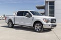 Ford F-150 display at a dealership. The Ford F150 is available in XL, XLT, Lariat, King Ranch, Platinum, and Limited models Royalty Free Stock Photo