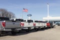 Ford F-150 display at a dealership. The Ford F150 is available in XL, XLT, Lariat, King Ranch, Platinum, and Limited models Royalty Free Stock Photo