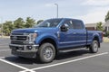 Ford F-250 display at a dealership. The Ford F250 is available in XL, XLT, Lariat, King Ranch, and Platinum models