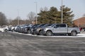 Ford F-250 display at a dealership in snow. The Ford F250 is available in XL, XLT, Lariat, King Ranch, and Platinum models