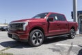 Ford F-150 Lightning display. Ford offers the F150 Lightning all-electric truck in Pro, XLT, Lariat, and Platinum models Royalty Free Stock Photo