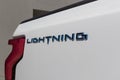 Ford F-150 Lightning display. Ford offers the F150 Lightning all-electric truck in Pro, XLT, Lariat, and Platinum models Royalty Free Stock Photo