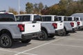 Ford F-150 Lightning fleet display. Ford offers the F150 Lightning all-electric truck in Pro, XLT, Lariat, and Platinum models Royalty Free Stock Photo