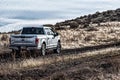 Ford F150 Silver Truck Car 4x4 SUV driving in the mud