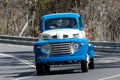 1948 Ford F5 Truck driving on country road