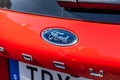 Ford logo on the back of a race red Ford Focus.. Royalty Free Stock Photo