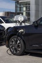 Ford Mach-E Mustang SUV at a dealership charger. Ford offers the Mach-E in Select, Premium, or GT models