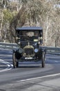 1915 Ford model T Tourer driving on country road