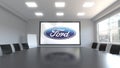 Ford Motor Company logo on the screen in a meeting room. Editorial 3D rendering