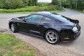 Ford Mustang 2018 black sports car on a sunny day view