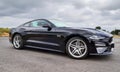 Ford Mustang 2018 black sports car on a sunny day view