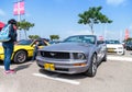 Ford Mustang cabriolet at the exhibition of old cars in the parking lot near the Big Regba shopping center