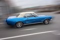 1968 Ford Mustang convertible classic pony car, rare blue color, in motion Royalty Free Stock Photo