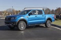 Ford Ranger pickup truck display at a dealership. Ford offers the Ranger in XL, XLT and Lariat models Royalty Free Stock Photo