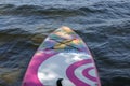 Fore part of inflatable board for sup surfing in the water close up view
