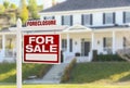 Foreclosure Home For Sale Sign in Front of Large House Royalty Free Stock Photo