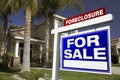 Foreclosure For Sale Real Estate Sign and House Royalty Free Stock Photo