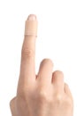 Forefinger of a woman hand with a band aid Royalty Free Stock Photo