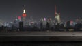 In the foreground of a cityscape is a wooden table top accompanied by a window with a blurry view Royalty Free Stock Photo
