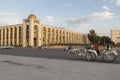 Bishkek, Kyrgyzstan August 9 2018: Ala-Too Square. In the foreground a coach drives tourists in the city