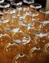 Foreground of glasses for wine in a bar