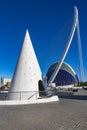 In the foreground one of the cone-shaped entrances to the car park and behind it the graceful bridge next to the building Agora in