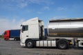 In the foreground a tanker truck. Parking for trucks Royalty Free Stock Photo